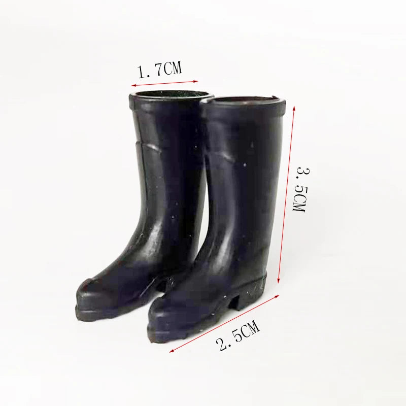 Botas de lluvia de goma negra en miniatura a escala 1:12 para figuras de casa de muñecas