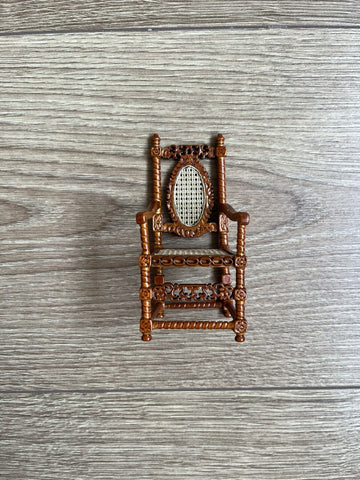 1:12 scale hand-carved walnut armchair with a woven mesh back